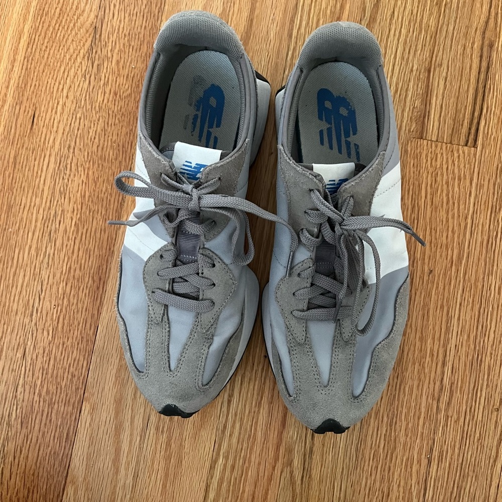 New balance gray and white mens size 9.5 which is ladies 11